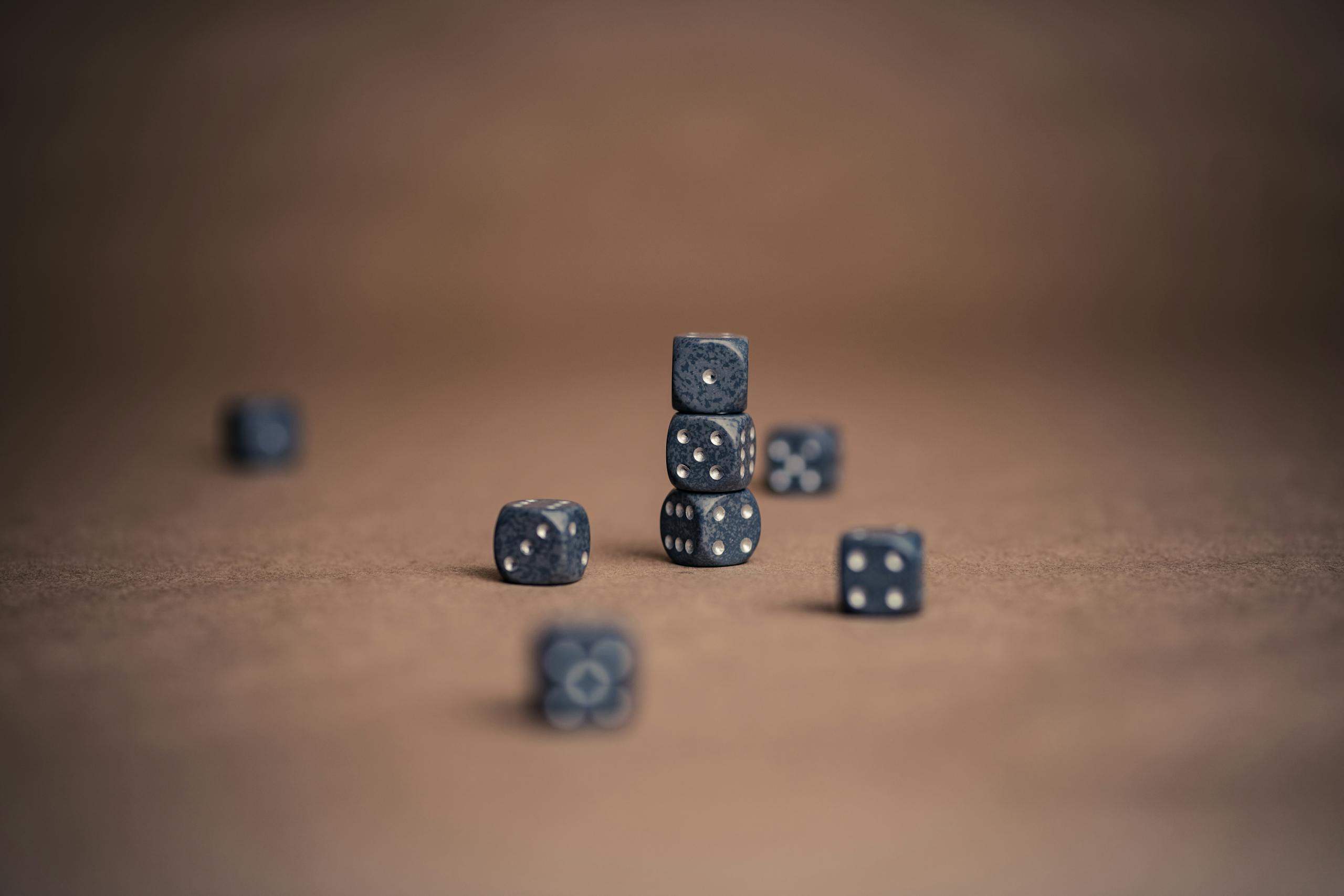 Celtic vs Kairat Prediction: Full Match Preview, Analysis & Betting Insights 2026 Artistic display of stacked dice showcasing luck and chance in a minimalist composition.