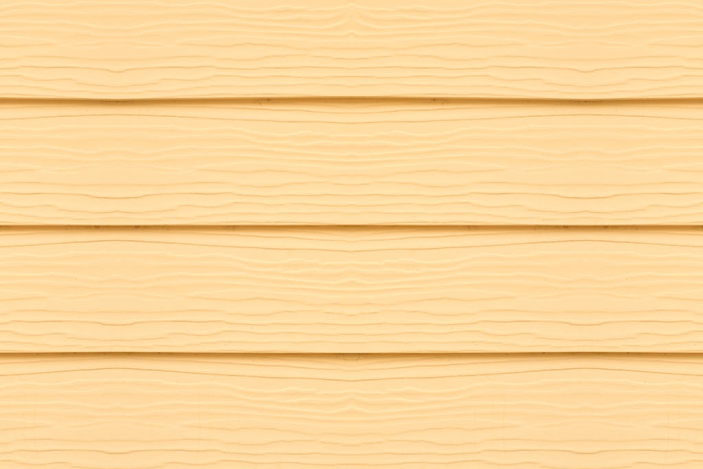 ReadSpeak Detailed close-up of textured yellow wooden panels, ideal for design projects.
