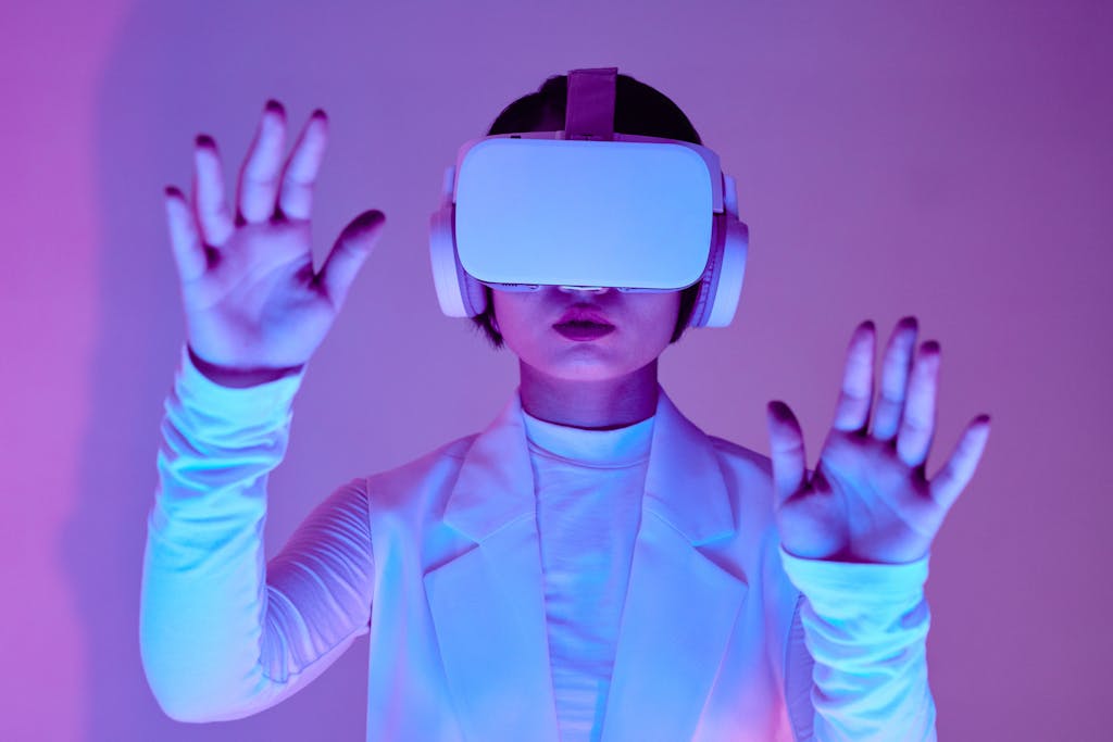 Edivawer Woman in white long sleeves using virtual reality headset in a conceptual studio shoot.