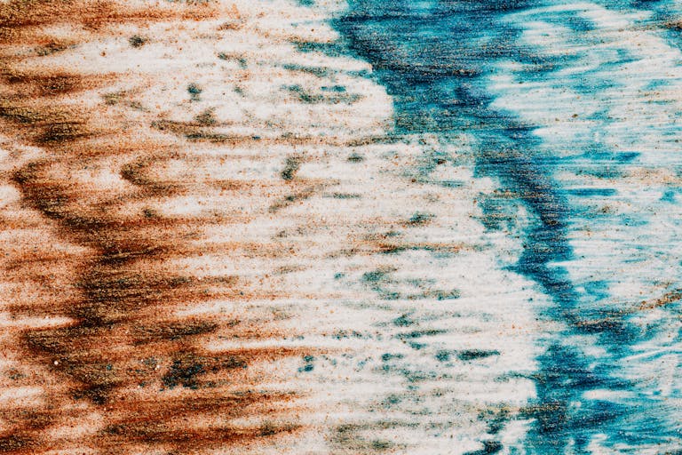 CenturyLinkOnline.com Abstract textured surface made of colorful paints of blue and brown colors on white background